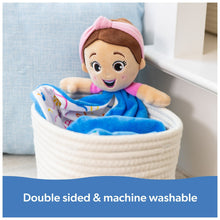 Plush lovey doll in pink hood with blue blanket folded in a basket