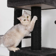 Dark grey cat tower with round post and enclosed cubby opening on top