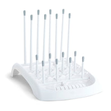 White baby bottle drying rack with upright pegs and foldable base
