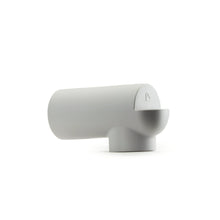 Gray silicone spout guard with outlet cup, three-quarter front view