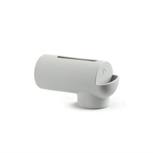 Gray silicone spout guard with built-in bubble bath dispenser, front outlet view