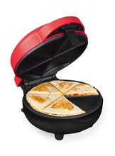 Red and black street taco quesadilla maker with lid open and four-part quesadilla