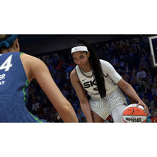 Basketball video game screenshot of a player dribbling an orange basketball