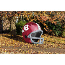 Red inflatable football helmet with white 8 and gray face guard