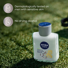 Sensitive post shave balm bottle with silver cap on green grass backdrop