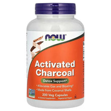 Activated charcoal supplement bottle with purple cap, orange label on white container