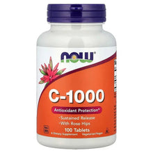 Vitamin C supplement bottle with purple cap and C-1000 label