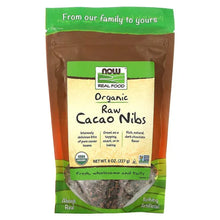 Organic raw cacao nibs pouch with green top label and visible product window.