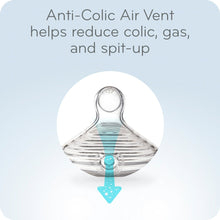 Clear baby bottle nipple with anti-colic air vent, close-up valve area