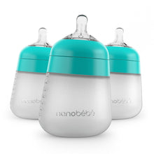 Teal and white silicone baby bottles, three pack, anti-colic nipples.