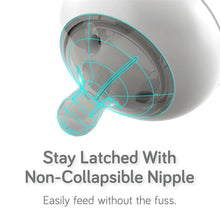 Silicone baby bottle nipple and anti-colic valve view with soft flex design.
