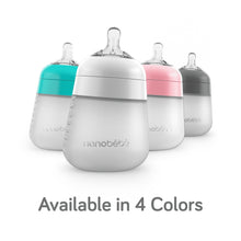 Silicone baby bottles in four colors, three pack option with anti-colic nipples.