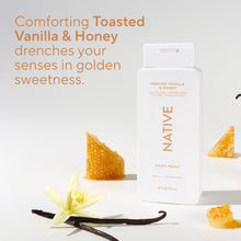 Native body wash bottle, Toasted Vanilla & Honey, with vanilla pods and flower