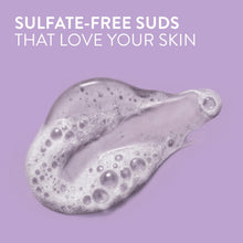 Thick body wash suds in a curved splash