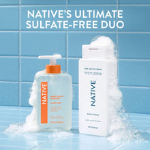 Native sulfate-free body wash bottles with foam on countertop