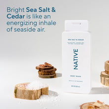 Native Sea Salt & Cedar body wash bottle with sea salt and cedar-wood pieces
