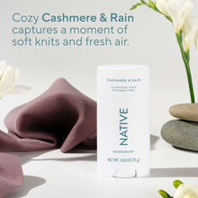 Native deodorant stick in Cashmere & Rain scent, white tube with teal label on top