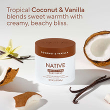Coconut & Vanilla detoxifying body scrub jar with vanilla pods and coconut pieces