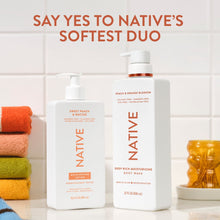 Body wash duo bottles on a counter, Sweet Peach and Peach & Orange Blossom with pumps.