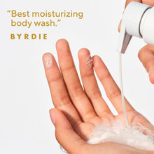 Foamy lather being dispensed onto hands from moisturizing body wash