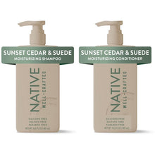 Native Sunset Cedar & Suede shampoo and conditioner bottles with pumps, front view