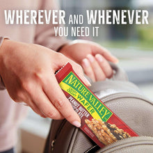 Peanut butter chocolate wafer bar held in a hand