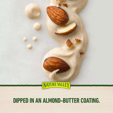 Almond granola bar pieces with almond-butter coating and chopped almonds