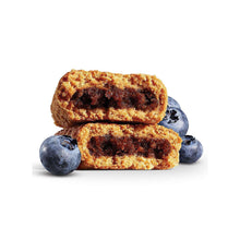 Stacked fig bars with blueberries beside the bars