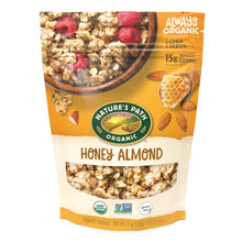 Organic honey almond granola pouch with cluster and berry design