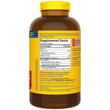 Fish oil supplement bottle with yellow cap, brown label showing Supplement Facts panel