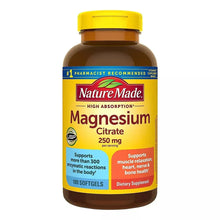 Nature Made magnesium citrate softgel bottle, yellow cap, brown label