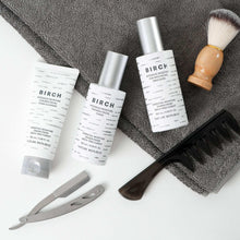 Three birch intensive moisture facial bottles with silver caps