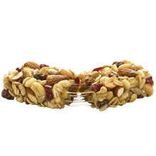 Chewy trail mix granola bar with visible oats, nuts, and dried fruit pieces