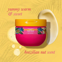 NatureWell Cheeky Cream jar with yellow lid and magenta body, brazilian nut scent