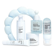 NatureWell skincare set bottles and jars arranged with a plush light-blue headband