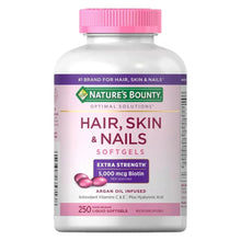 Nature's Bounty Hair, Skin & Nails softgels bottle with pink cap and purple label