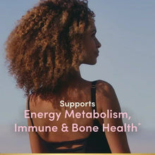 Women's multivitamin gummies ad with curly-haired woman and benefits text