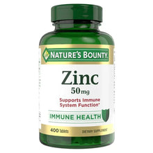 Zinc supplement bottle with dark green cap, Zinc 50 mg and Immune Health label
