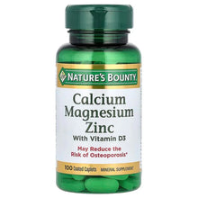 Calcium magnesium zinc vitamin D3 supplement bottle with green cap and coated caplets