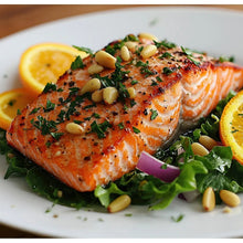Seasoned salmon with pine nuts, herbs, and lemon slices