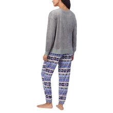 Women’s 2-piece pajama set with gray long-sleeve top and patterned pajama pants, side view