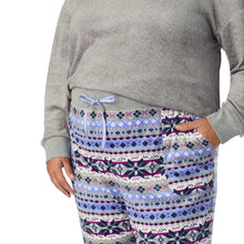 Gray pajama top with drawstring waist patterned pants, cropped front view