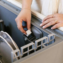 Unscented dishwasher detergent cube placed in front rack basket