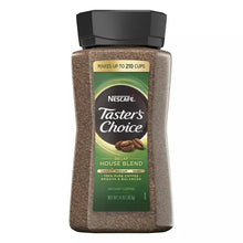 Instant coffee container with green label, decaf house blend, black lid.