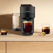 Liquorice Black Nespresso Vertuo Pop+ machine with two cups and capsule