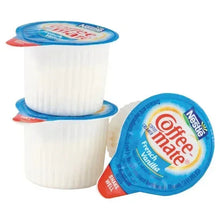 French vanilla Coffee-mate creamer cups with blue lid labels, two single servings
