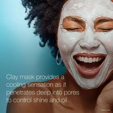 Clay face mask applied on face, creamy white texture with smoothing coverage