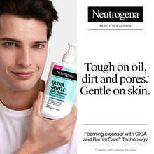 Neutrogena Ultra Gentle Daily Cleanser foaming cleanser pump bottle held in hand