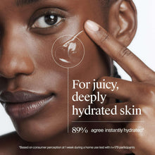 Hyaluronic acid face moisturizer gel smoothed on skin with glossy hydration sheen