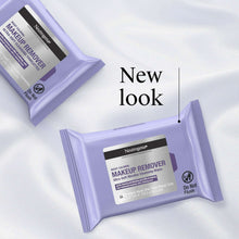 Two Neutrogena Night Calming Makeup Remover wipe packets on soft surface